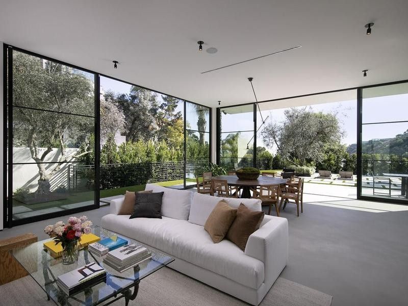 Modern living room with floor-to-ceiling windows