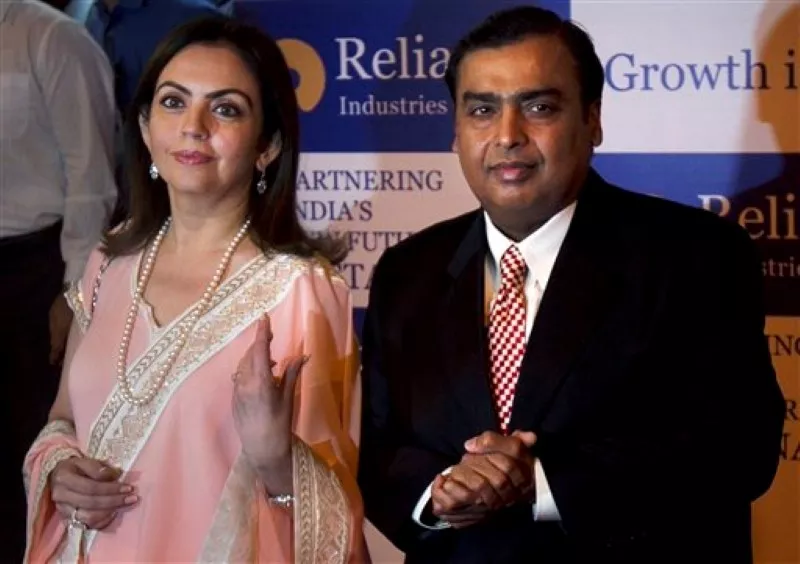 Reliance Industries chairman Mukesh Ambani, right, and his wife, Nita, at the company's annual general meeting in Mumbai, India, in 2012.