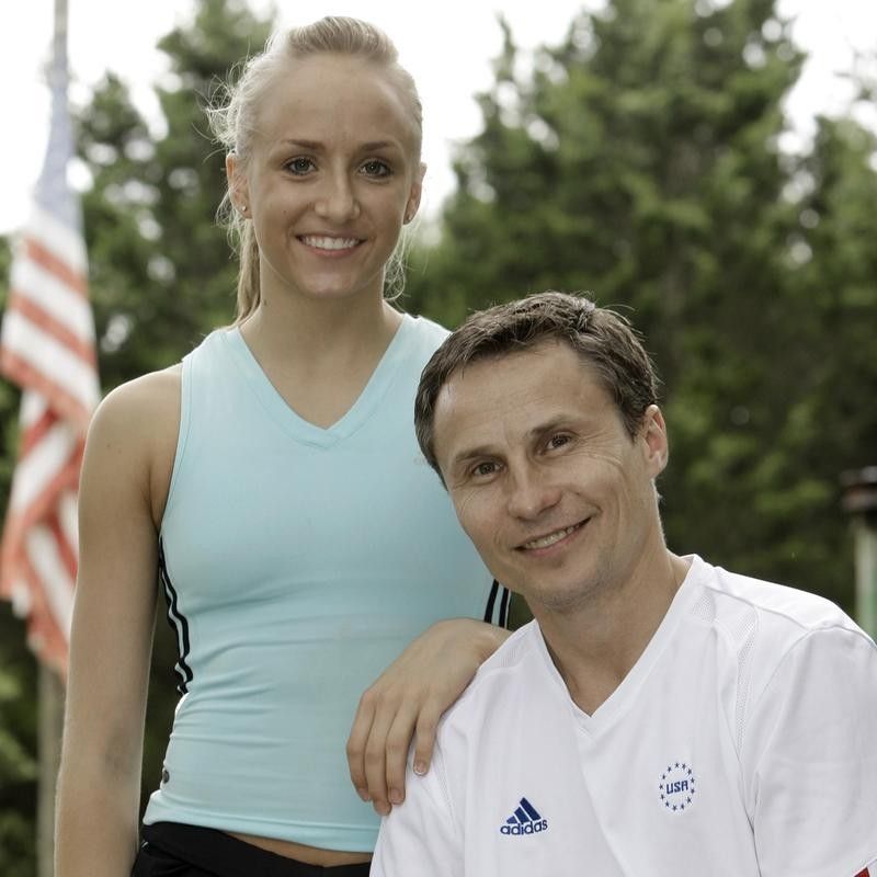 Nastia Liukin poses with coach and father Valeri Liukin at Karolyi's Camp
