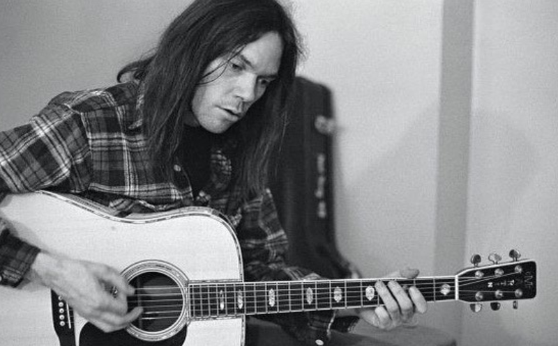 Neil Young with guitar