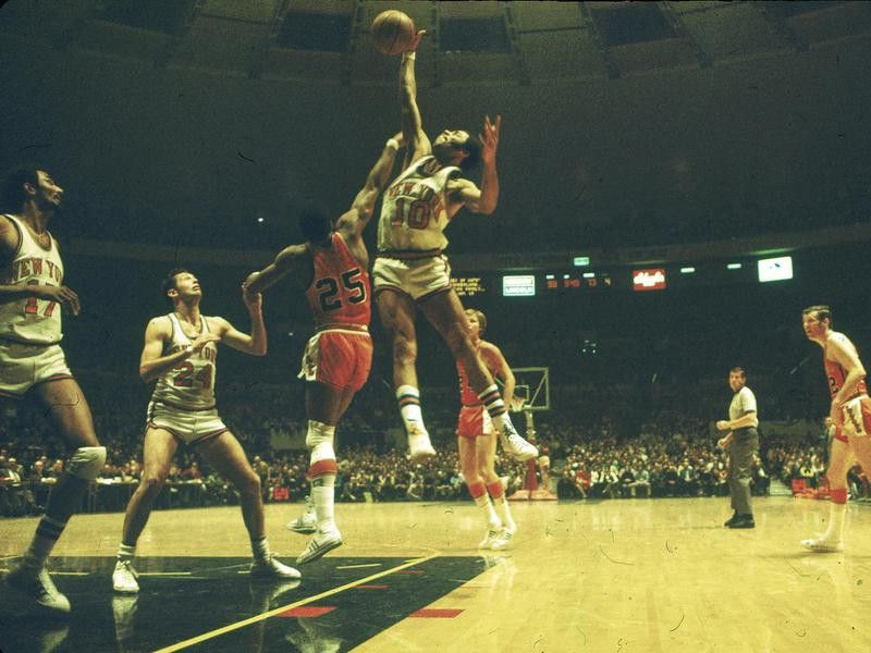 New York Knicks guard Walt Frazier jumps high
