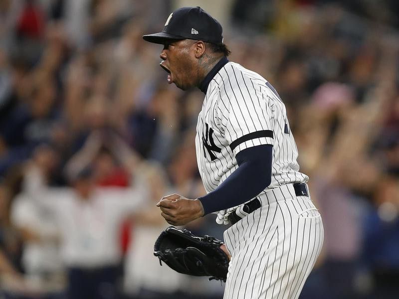 New York Yankees pitcher Aroldis Chapman reacts