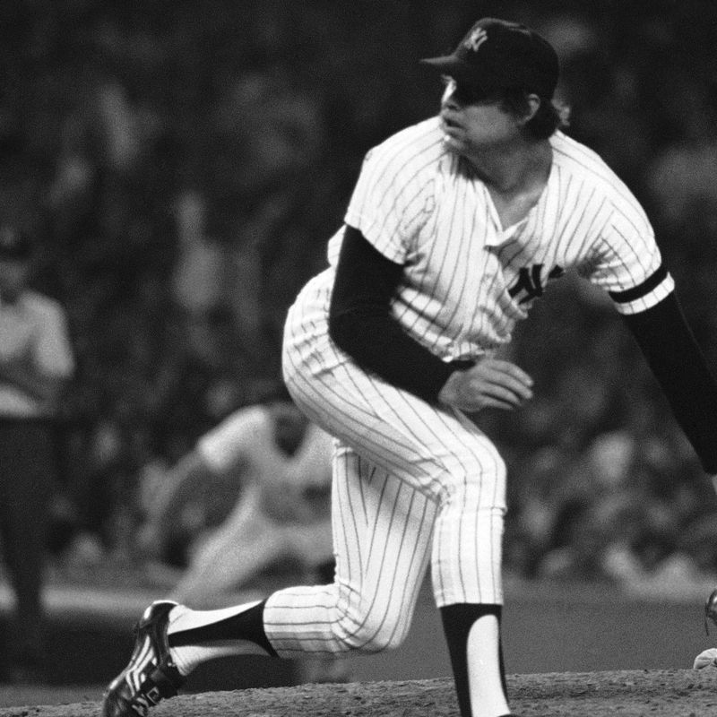New York Yankees relief pitcher Rich "Goose" Gossage peers toward home plate