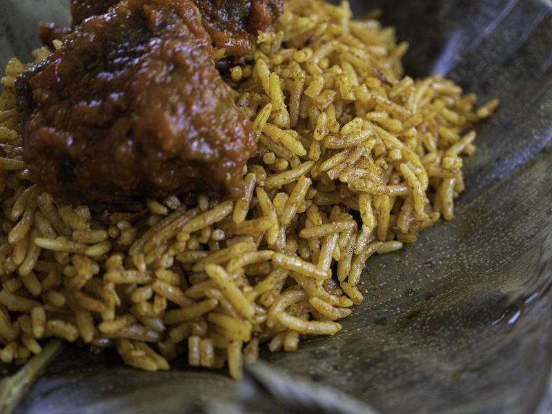 Nigerian Spicy Jollof rice served on a leaf