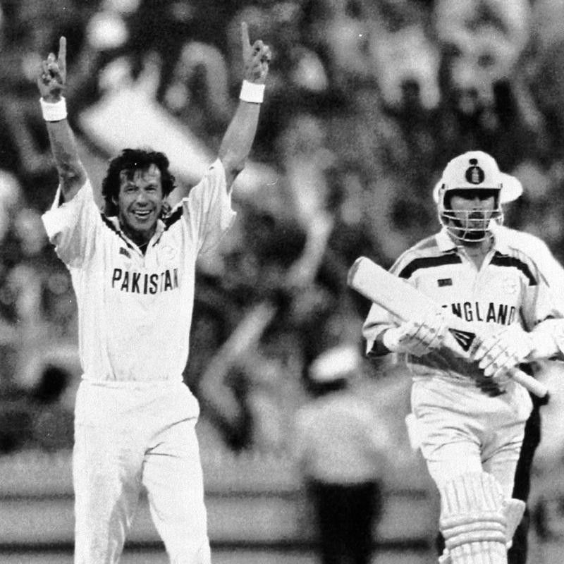 Pakistan captain Imran Khan raises his arms in triumph