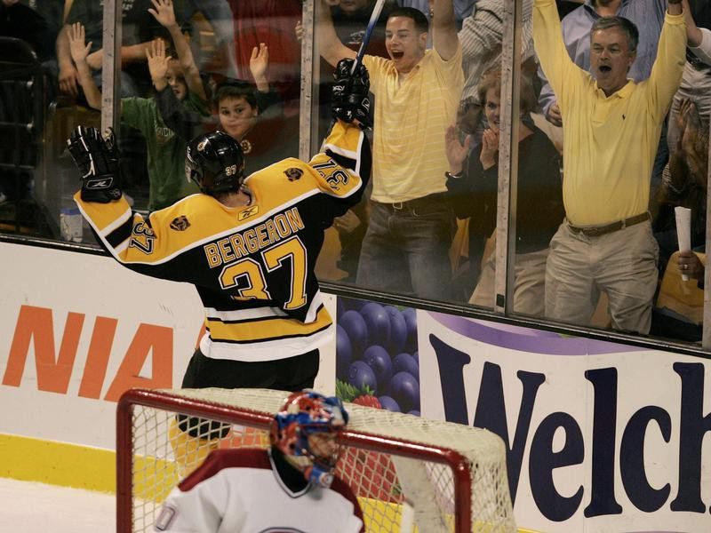 Patrice Bergeron scores and celebrates with fans