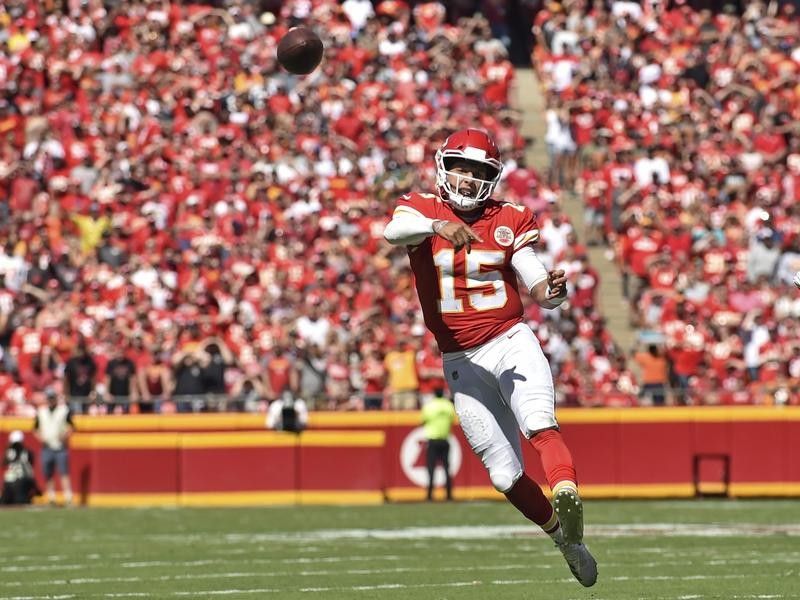 Patrick Mahomes throws a touchdown pass against the San Francisco 49ers