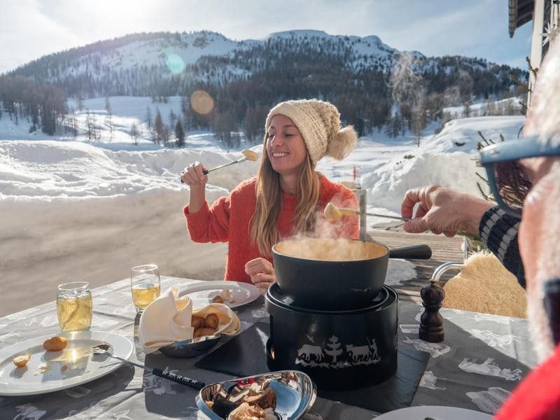 People eating fondue in Switzerland