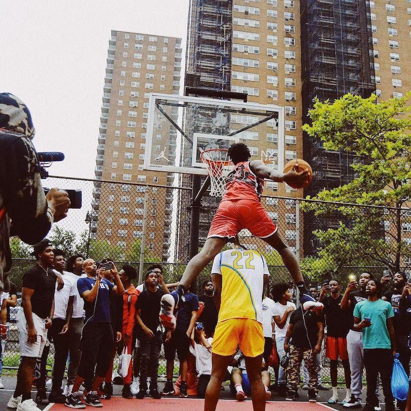People playing basketball at Rucker Park