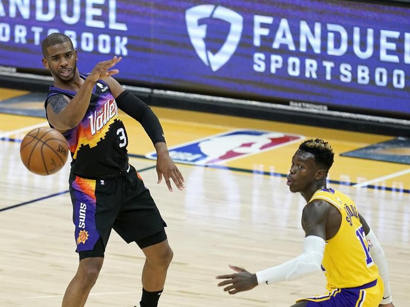 Phoenix Suns guard Chris Paul passes the ball against Los Angeles Lakers