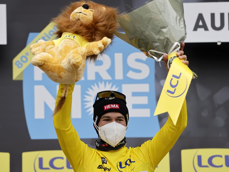 Primoz Roglic wearing overall leader yellow jersey