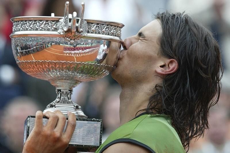 Rafael Nadal kisses the French Open trophy
