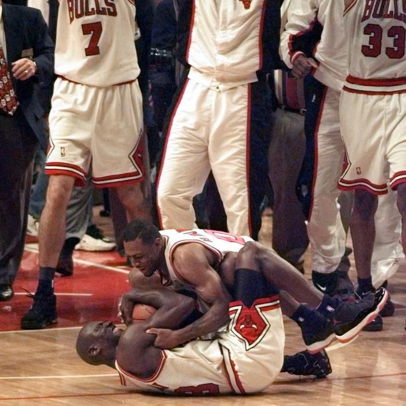Randy Brown hugs Michael Jordan after winning the NBA championship