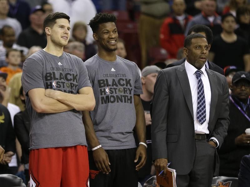 Randy Brown with Doug McDermott and Jimmy Butler during game against Sacramento Kings