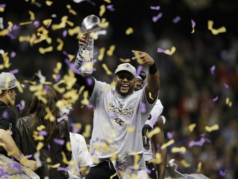 Ray Lewis celebrates with the Vince Lombardi trophy