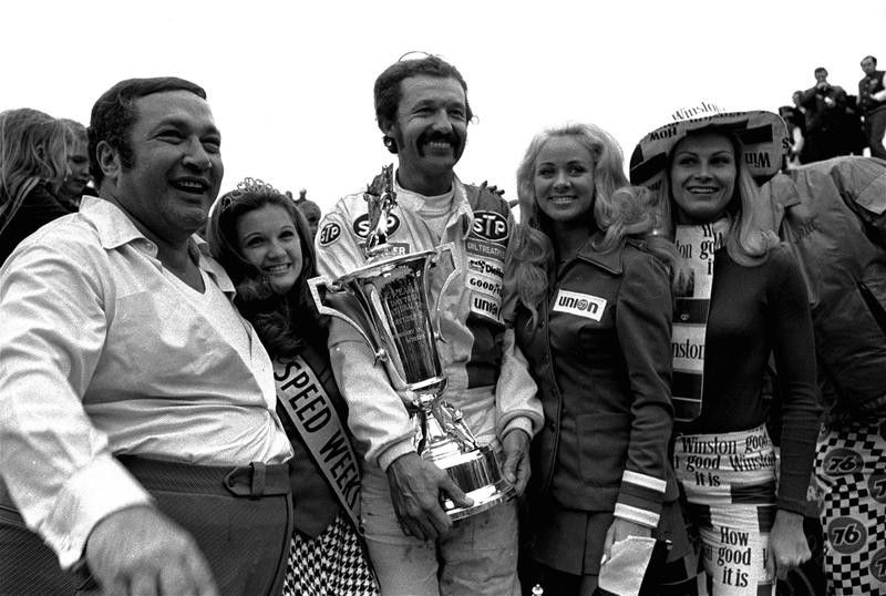 Richard Petty poses with trophy after winning Daytona 500