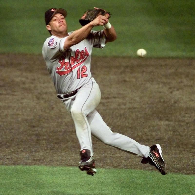 Roberto Alomar throws out Roberts of the Cleveland Indians in American League Championship Series