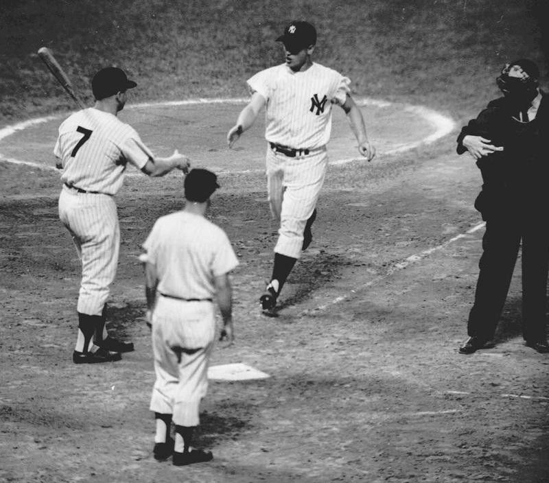 Roger Maris congratulated by Mickey Mantle