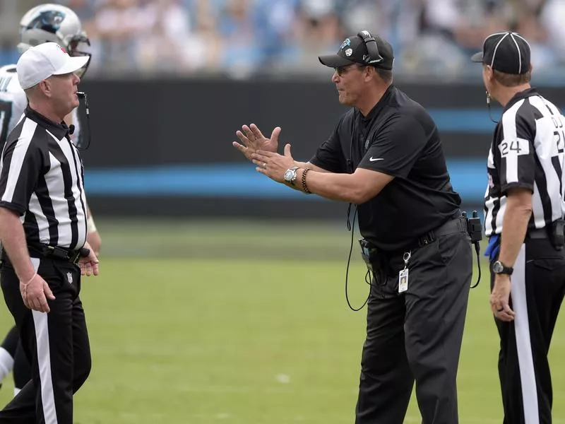Carolina Panthers head coach Ron Rivera calls a timeout during a 2018 game against the Cincinnati Bengals in Charlotte, N.C.