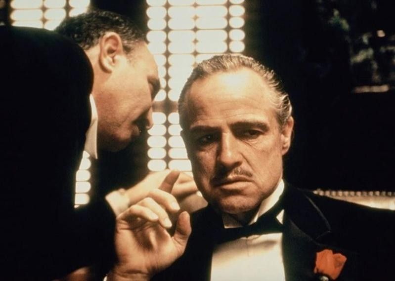 Salvatore Corsitto speaking to Marlon Brando in The Godfather