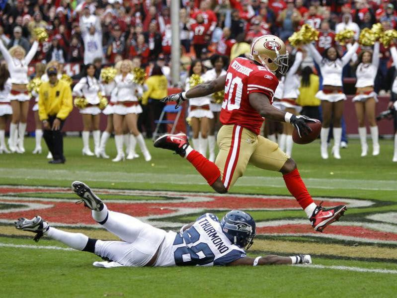 San Francisco 49ers running back Brian Westbrook jumps over Seattle Seahawks