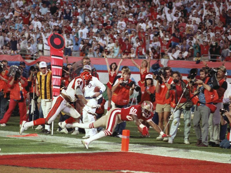 San Francisco 49ers wide receiver Jerry Rice dives into end zone for touchdown