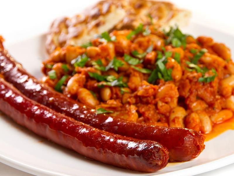 Sausages and beans stew with parsley