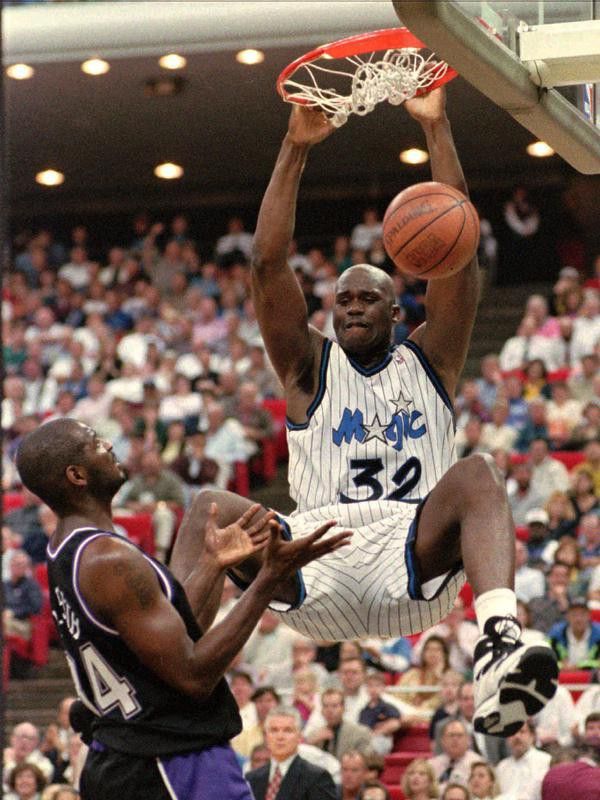 Shaquille O'Neal dunks