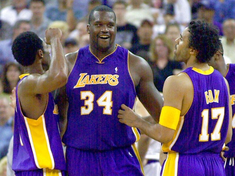 Shaquille O'Neal with Kobe Bryant and Rick Fox on the 2001 Los Angeles Lakers