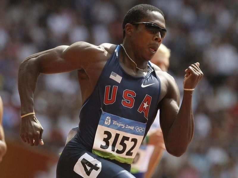 Shawn Crawford competes in 200- meter race at 2009 Beijing Olympics