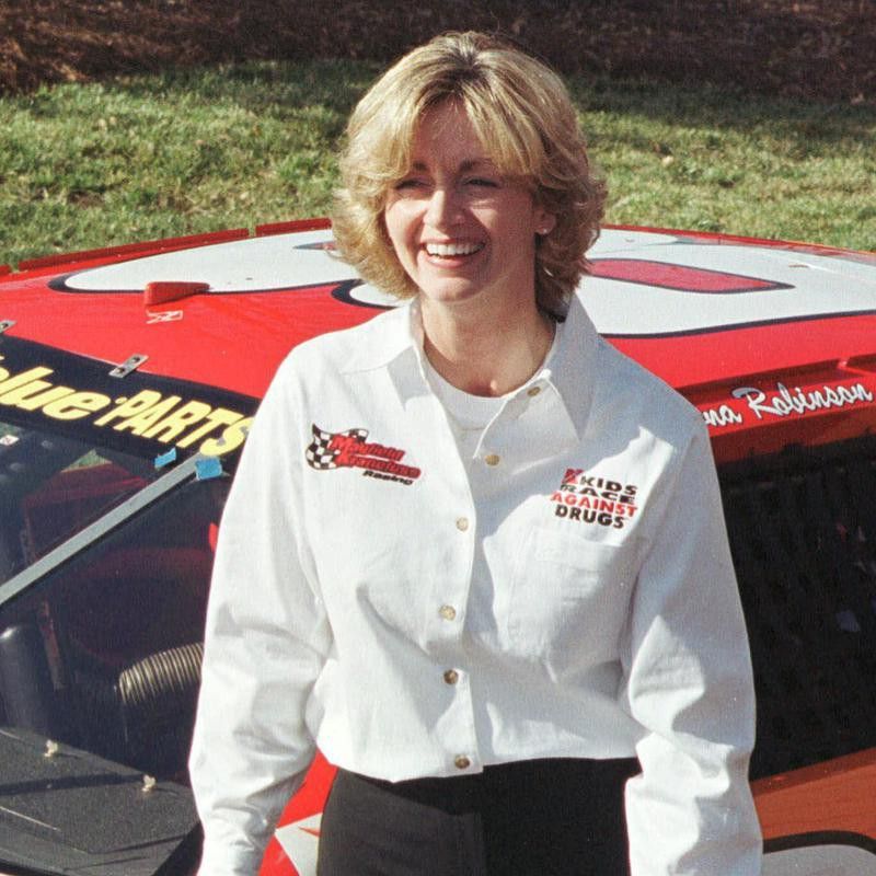 Shawna Robinson stands by ARCA series race car