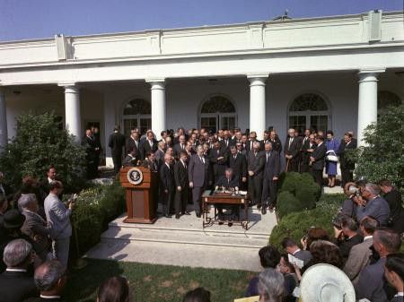 Signing of Poverty Bill 1964
