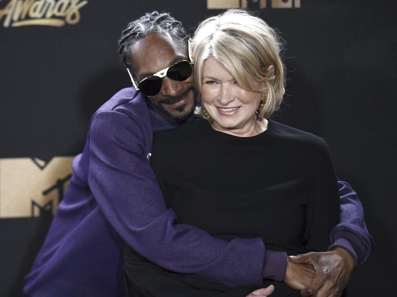 Snoop Dogg giving Martha Stewart a hug