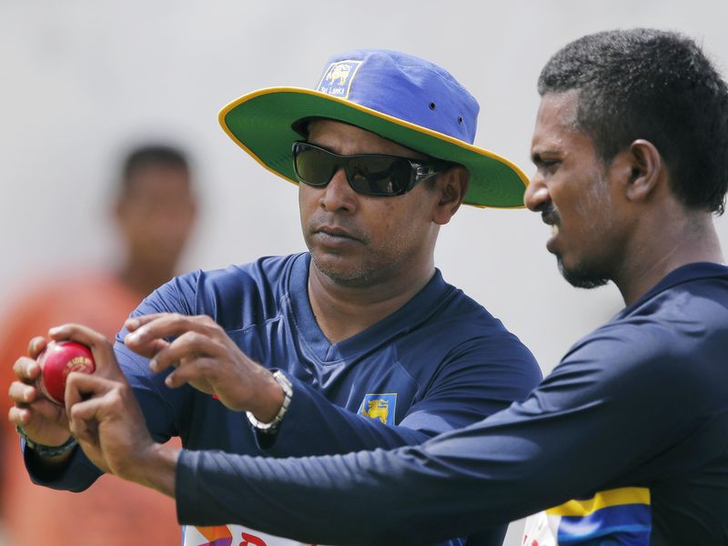 Sri Lanka's fast bowling coach Chaminda Vaas instructs bowler Vishwa Fernando