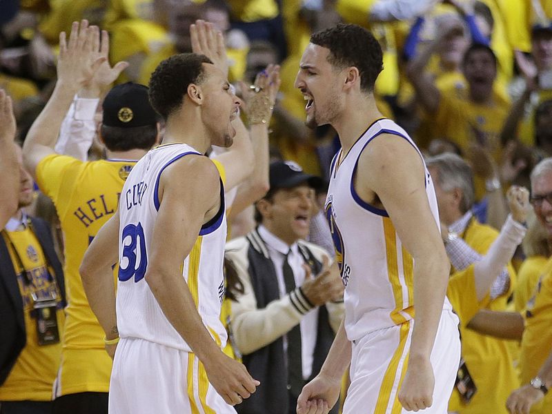 Stephen Curry and Klay Thompson celebrate