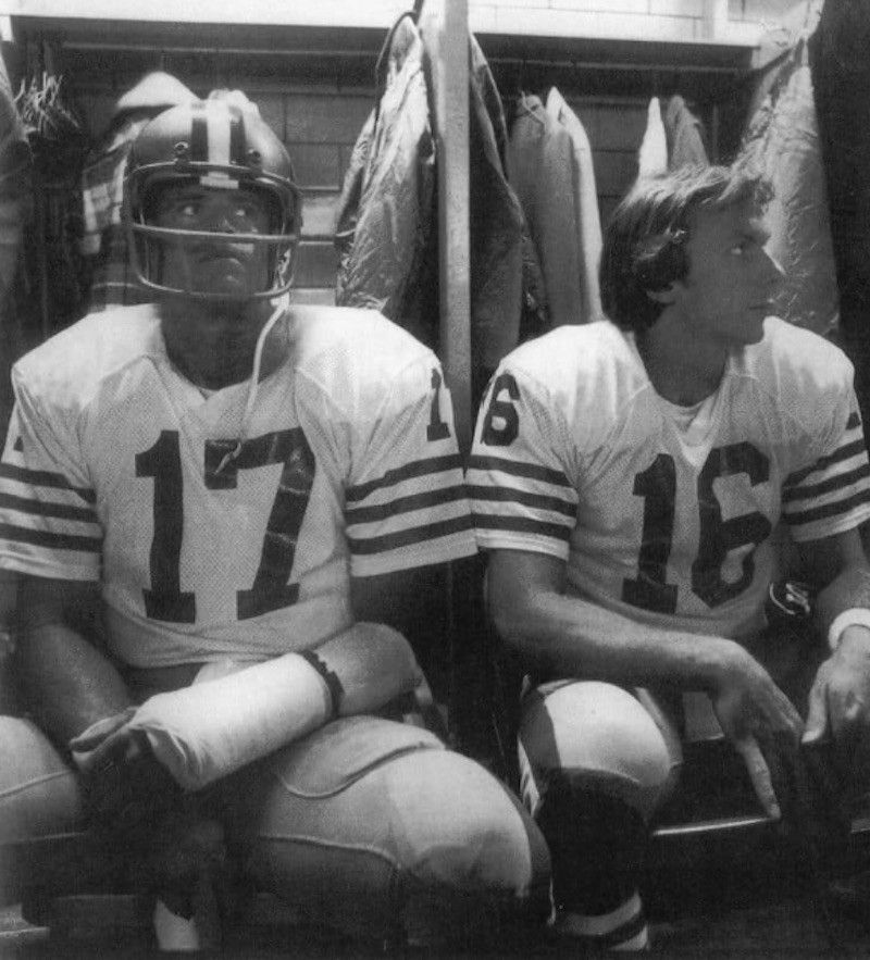 Steve DeBerg sitting in locker room with Joe Montana