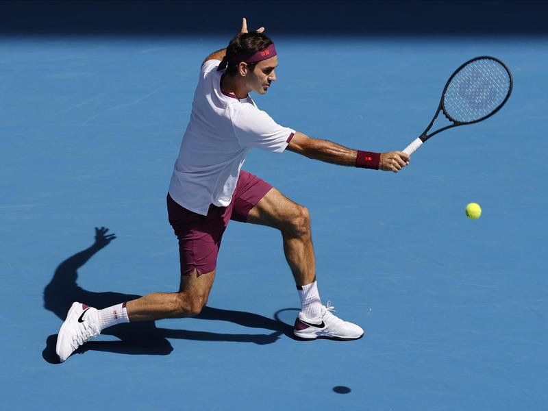 Switzerland's Roger Federer makes backhand return