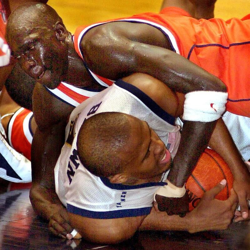 Syracuse's Kueth Duany battles with Pittsburgh guard Jaron Brown