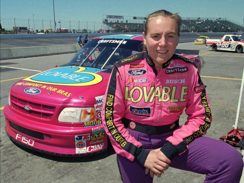 Tammy Jo Kirk poses in front of her hot pink truck