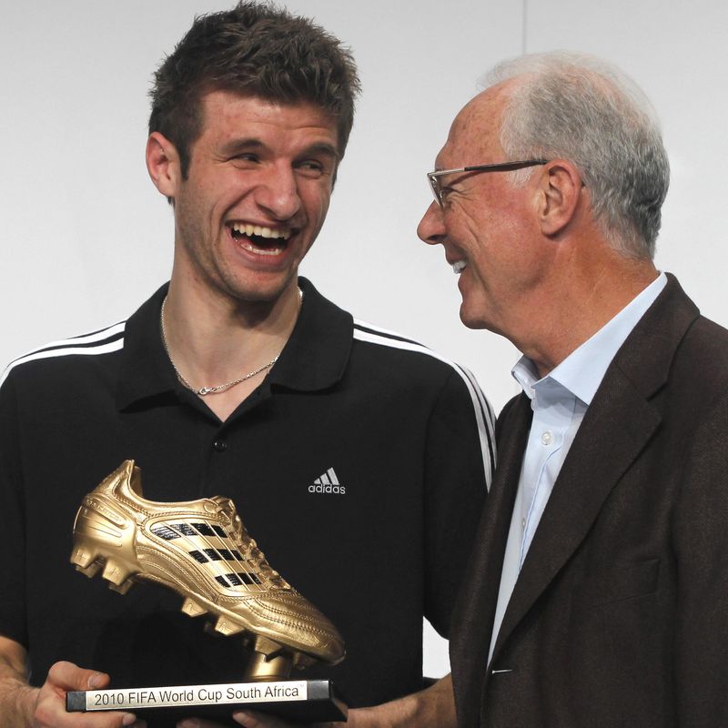Thomas Mueller laughs with golden boot