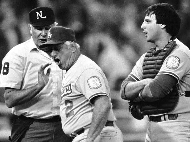 Tommy Lasorda argues with first base umpire Andy Olsen
