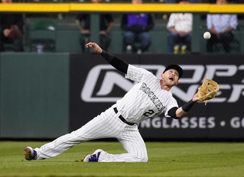 Trevor Story dives to catch ball against Phillies
