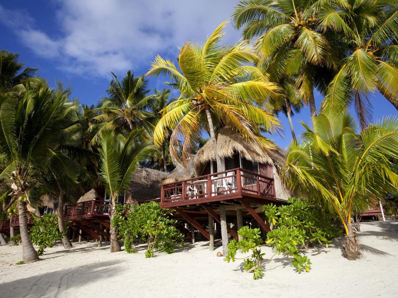 Tropical beach huts in Aitutaki, Cook Islands