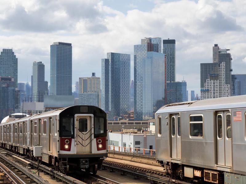 Two Subway Trains Speeding on Elevated Track in Queens, New York