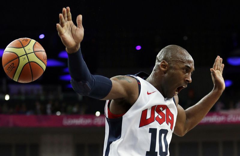 United States' Kobe Bryant reacts after a dunk
