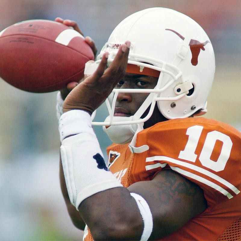 Vince Young warms up at Texas