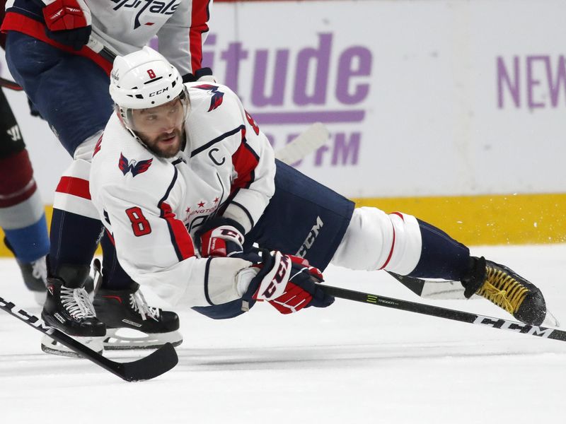 Washington Capitals Alex Ovechkin falls on ice