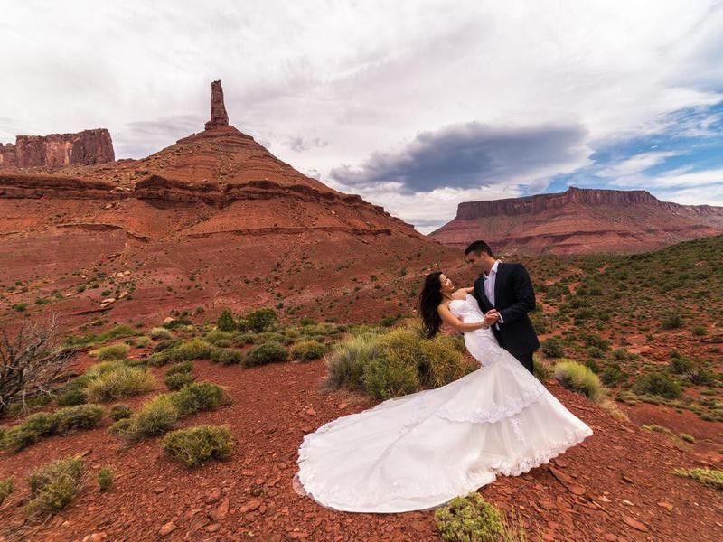 Wedding Photography.  Bride & groom in the Utah desert, Moab.
