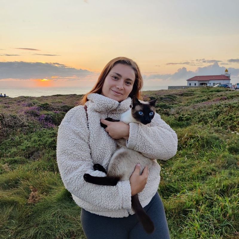 Woman hiking in Spain with cat