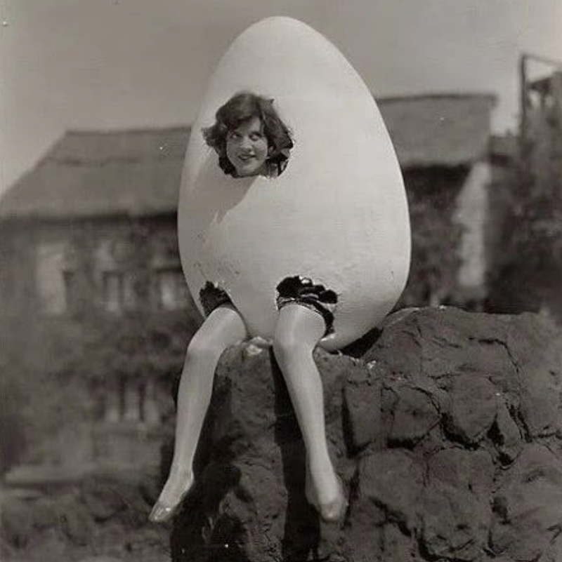 Woman posing as Humpty Dumpty